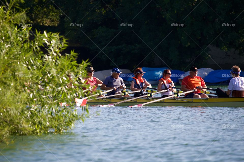 People Having Fun Rowing