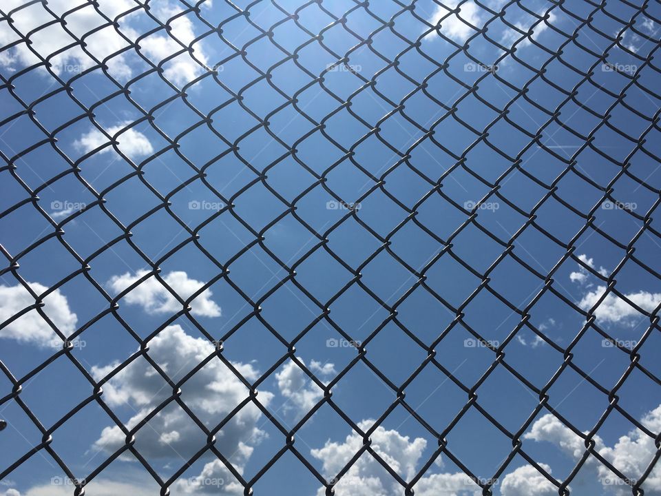 Clouds Behind an Iron Fence