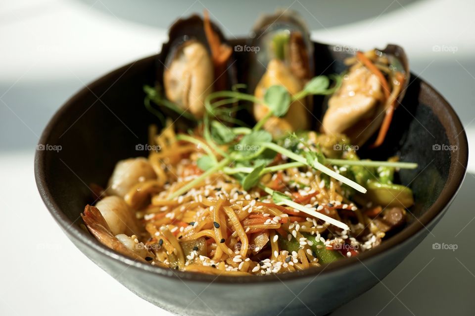 close-up of a plate with Asian cuisine