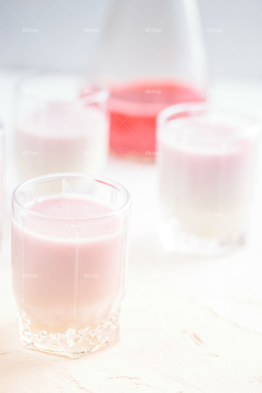 Milk liquor with raspberry syrup