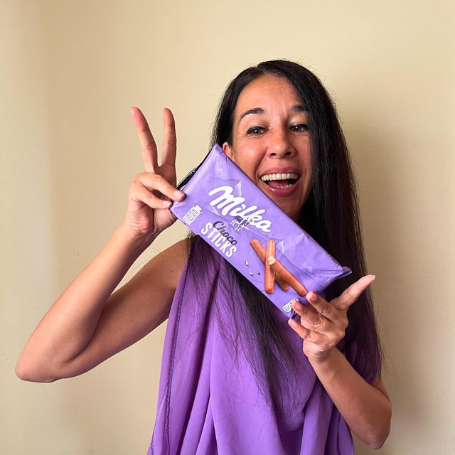 Energetic, Light - Hearted Portrait of Beautiful Smiling Woman with Products