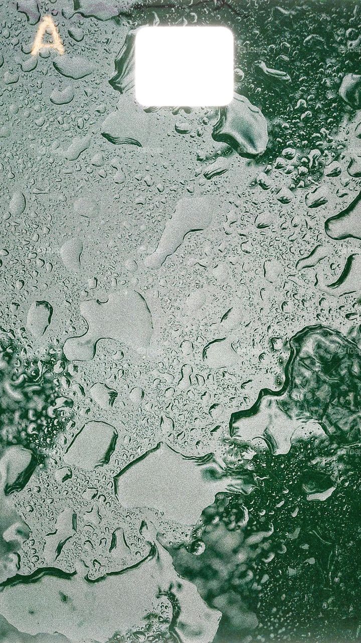 Rain on the sunroof of a Honda Pilot, creative rain drops