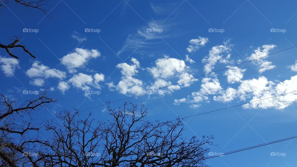 I enjoy taking pictures of clouds because they are ever changing.