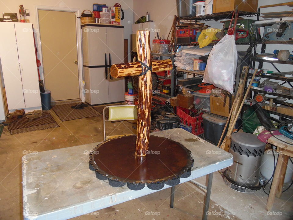 saw blade cross. this is a picture of a cross made out of cedar posts, it has five coats of laquer