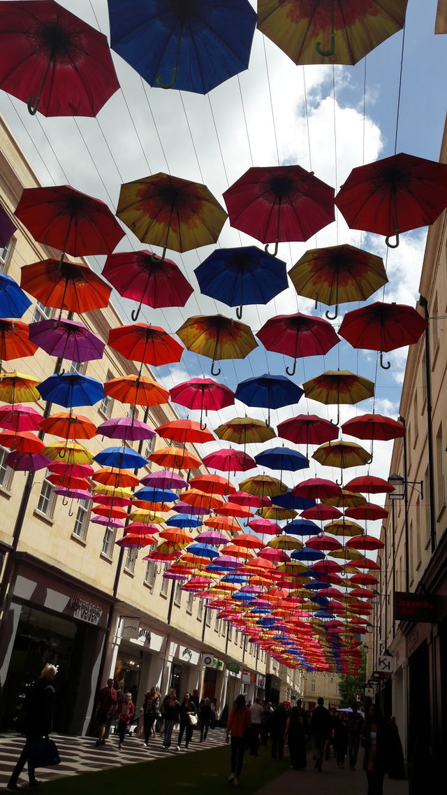 umbrellas hanging up at shopping centre in bath
