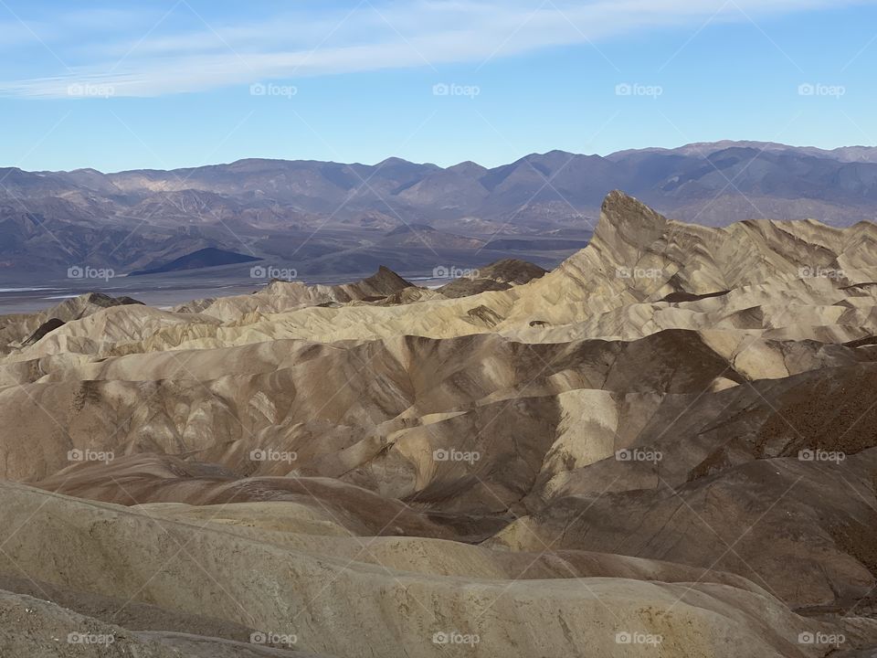 Looking out towards the Badlands in Death Valley National Park from Zabriskie point in early spring 
