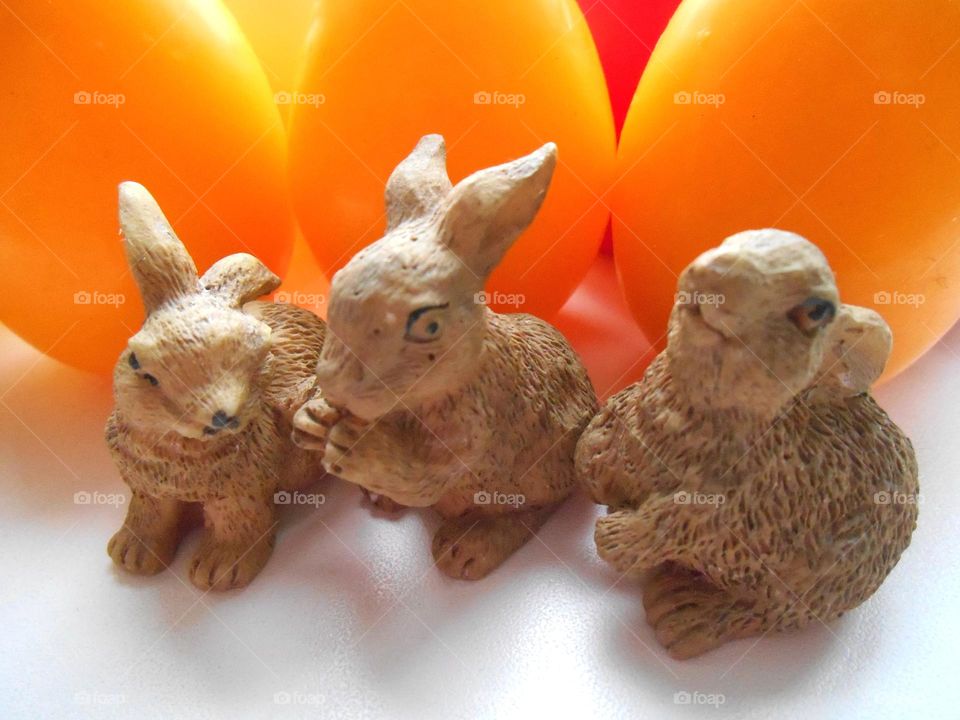 decorative rabbit souvenirs and colour eggs spring holiday, symbol New Year