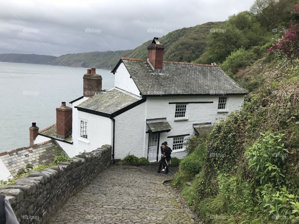 One of the very smart black and white cottages right on the coastline of Clovelly.