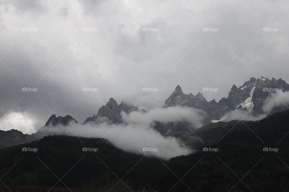 Cloudy grey sky over the mountains 