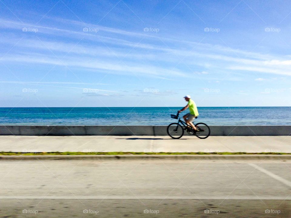 Cyclist on beach