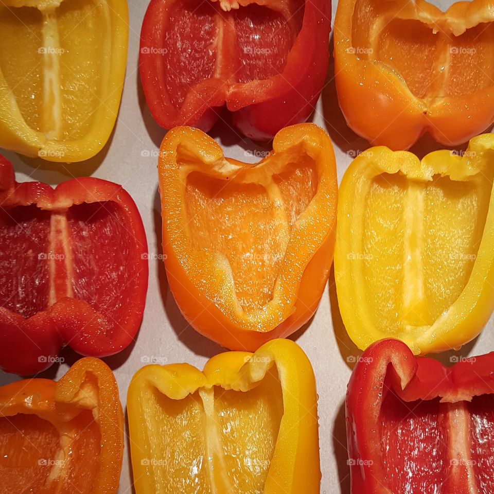 red, orange, and yellow peppers ready for what's next.