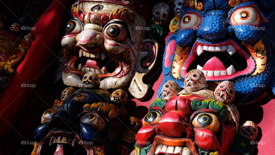 Souvenirs, masks being sold in a market