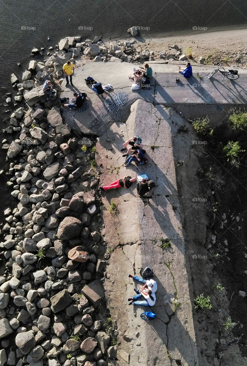 People resting by Vistula river