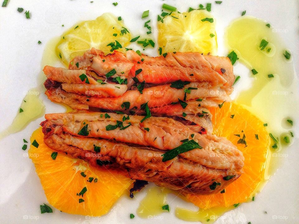 Anchovy fillet in citrus glaze