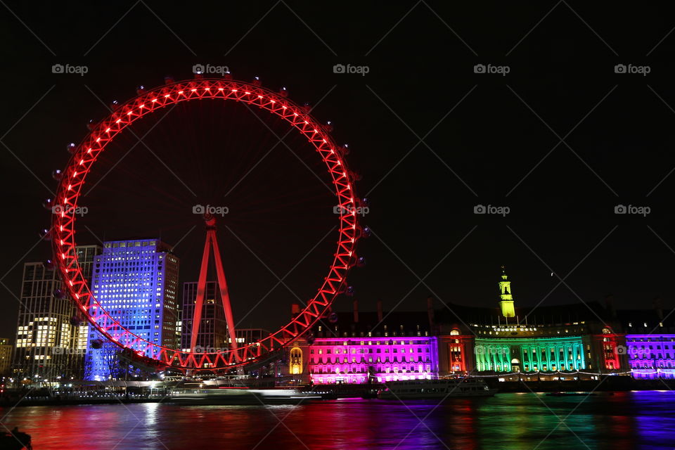 eye of london with coloured buildings