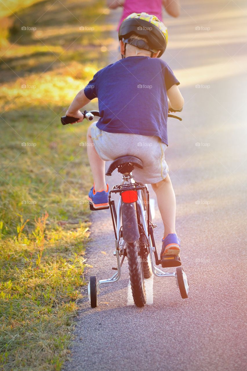 Bicycling. A boy training on his bicycle