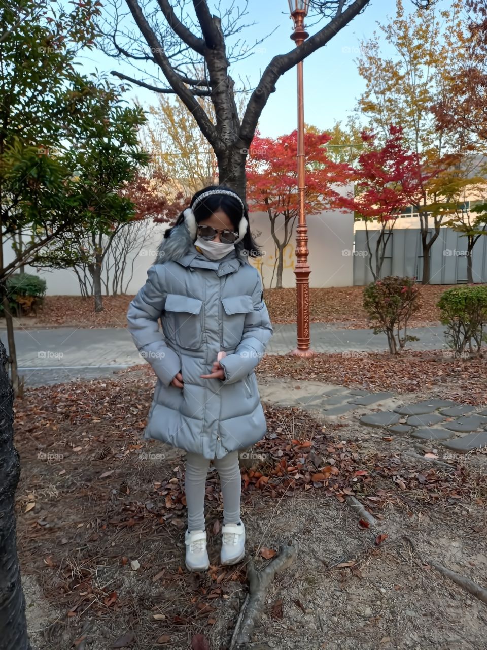 picking up stones and put it inside in her pocket is one of her attitude everytime she's  outside. today is not an exception.