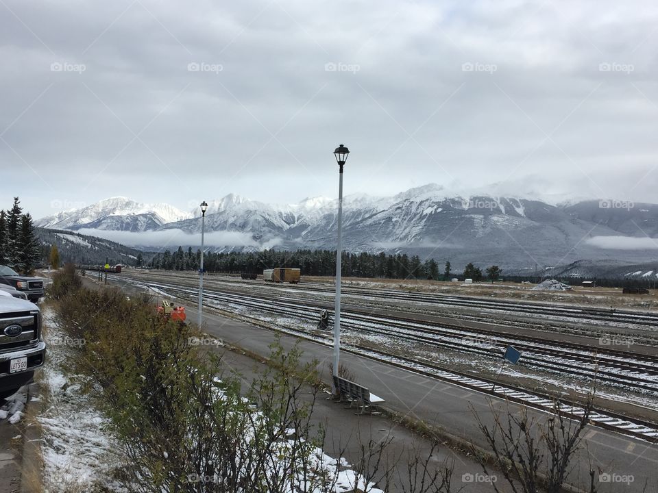 View of the mountains and the train tracks in the town of Jasper.   Jasper National Park, Alberta.