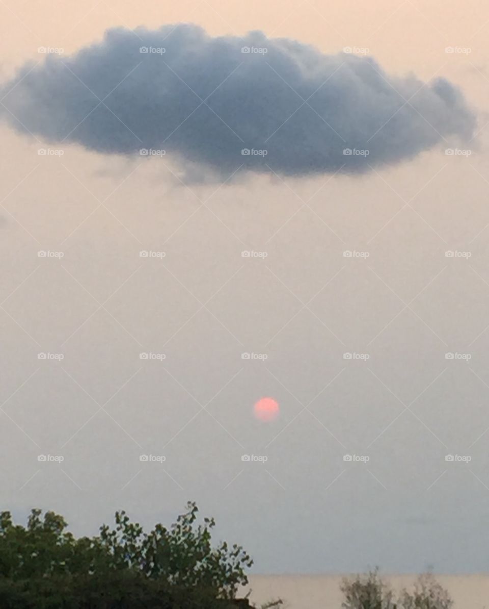 Cloud over sun 