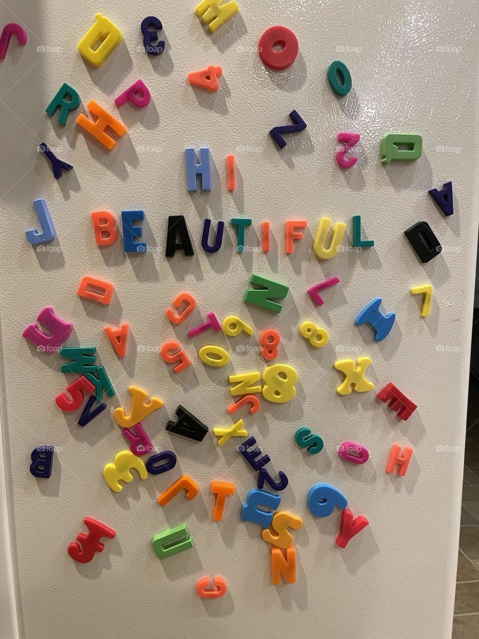 Messages on the fridge, hi beautiful, spelling positive messages, magnetic letters on the refrigerator, positive vibes on the fridge