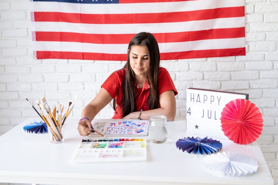 woman holding USA flag