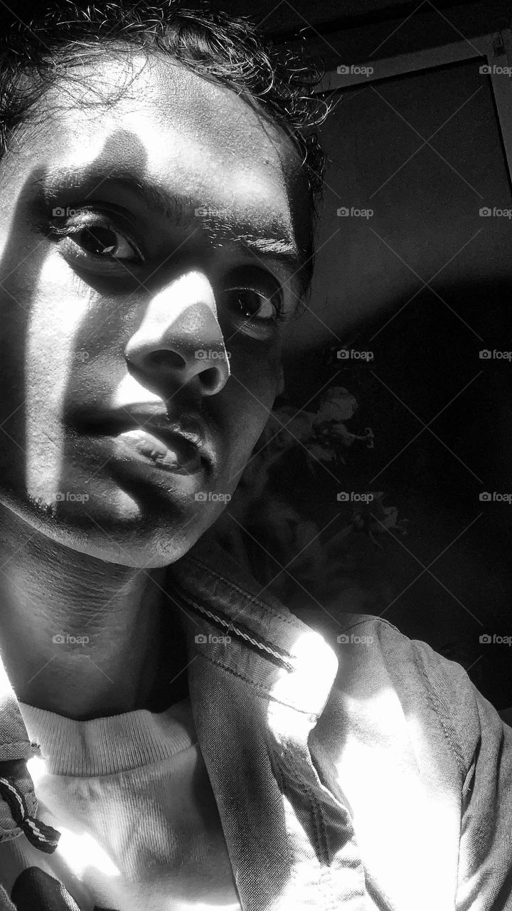 A selfie taken by me when the morning Sunlight falling on my face from the window