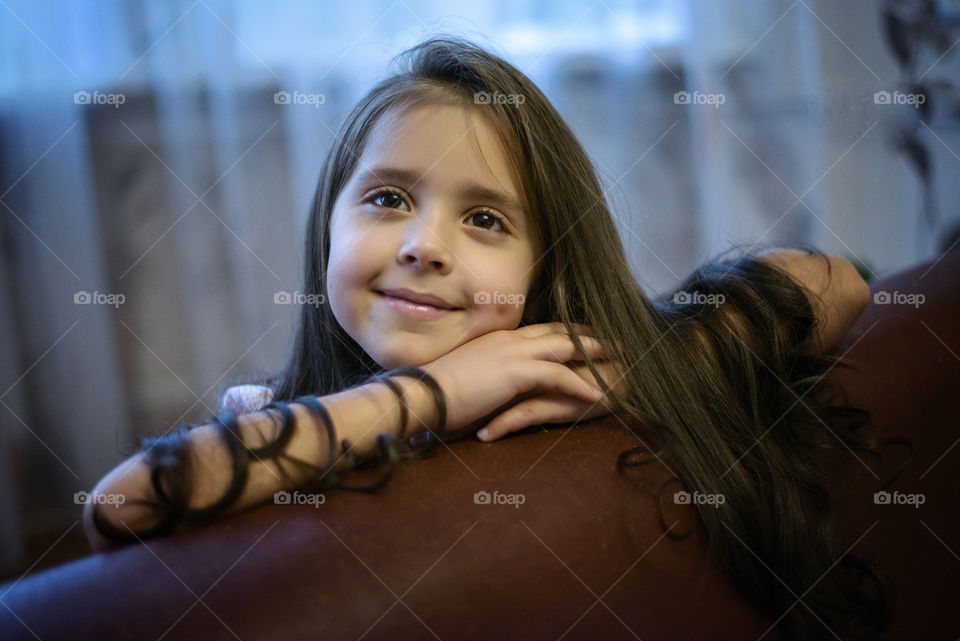 Close-up of a smiling young girl