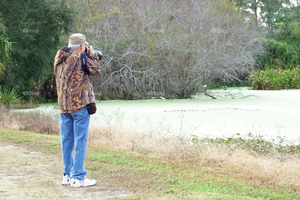 Photographer at the wetlands.