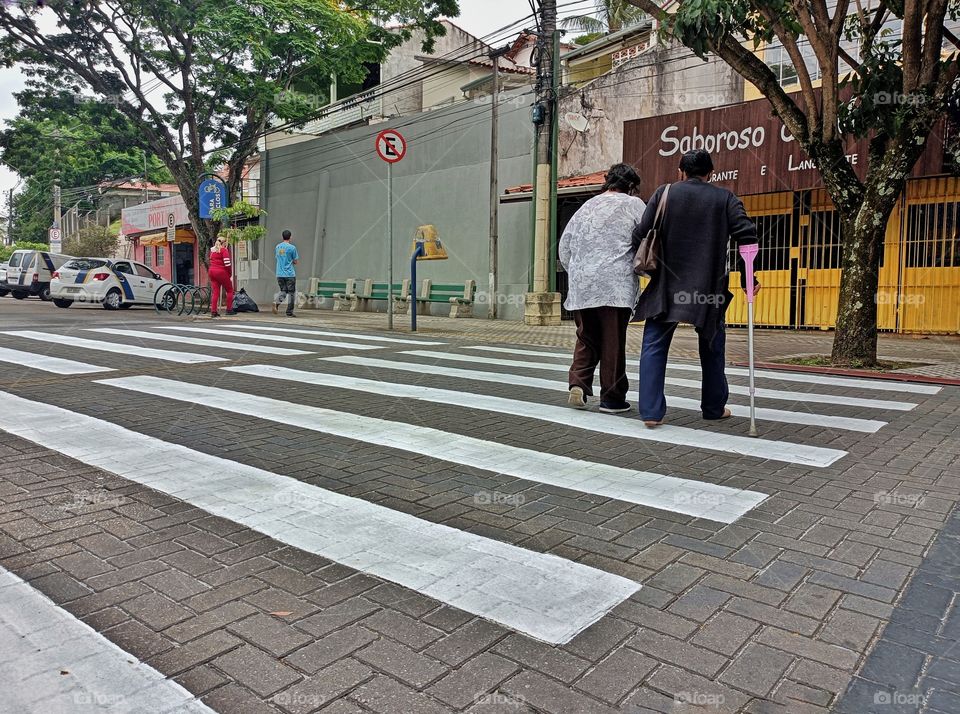 Two ladies at the crosswalk