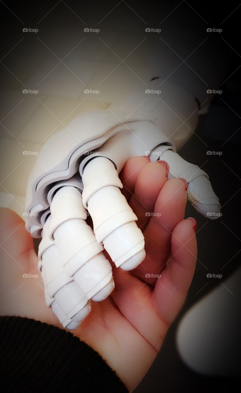 First human touch with a humanoid.