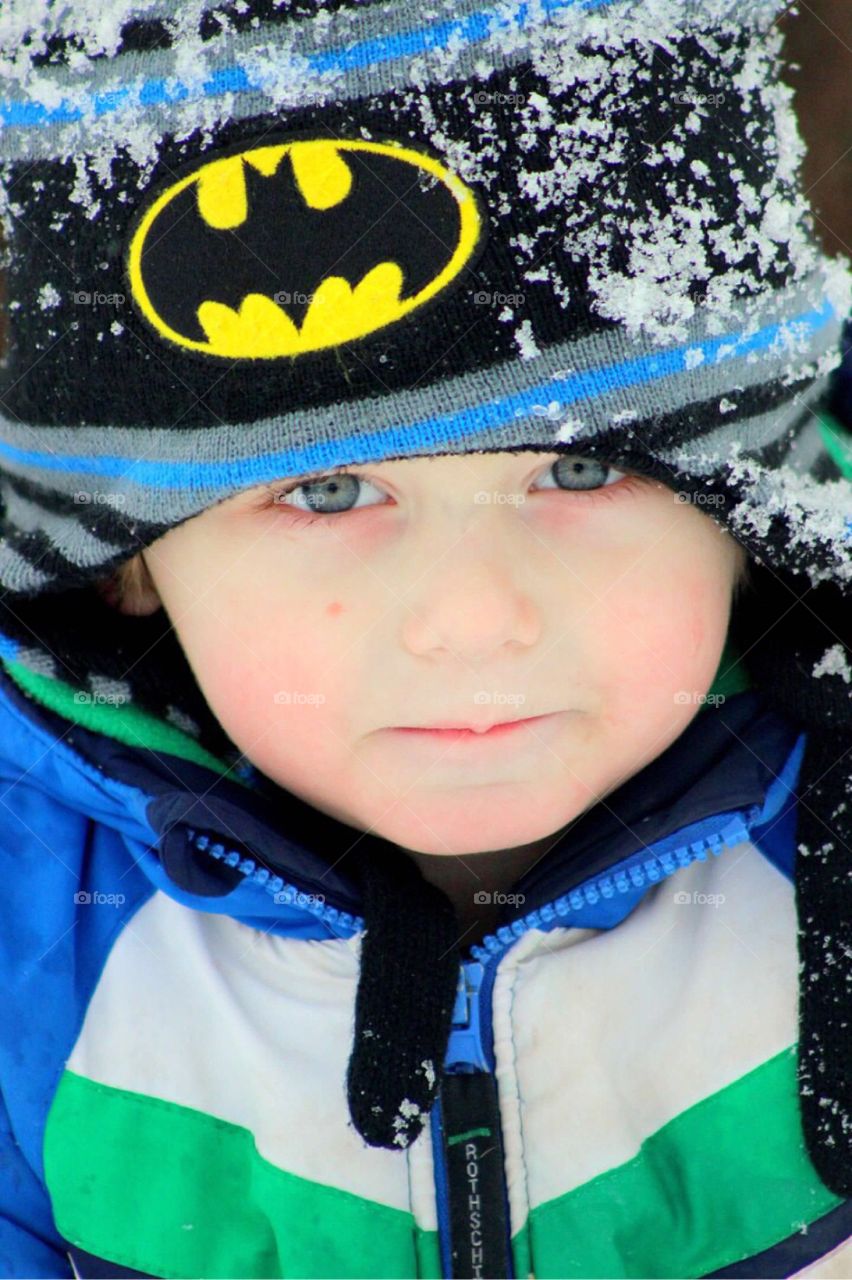 Close-up of boy wearing warm clothing