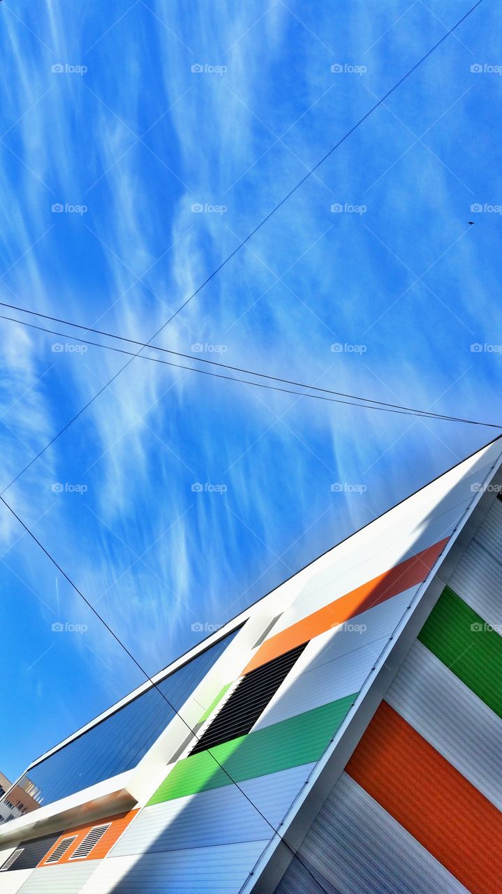 Low angle view of colorful building against sky