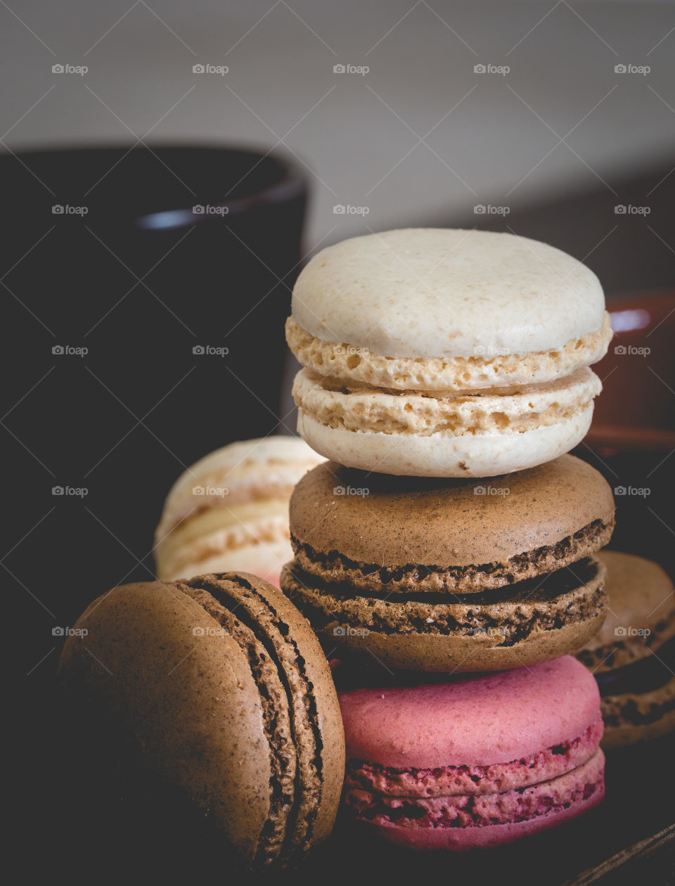 A stack of delicious macaroons or macarons for a sweet treat during a coffee break