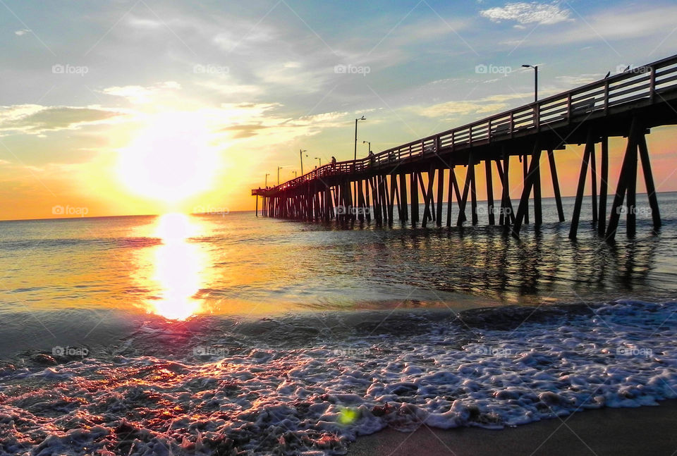 Fishing pier at sun rise