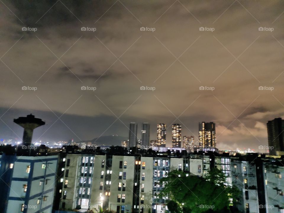 Amazing 50:50 %👁️Look Of Snap..
Cloudy ☁️ Sky Vs Multistory Building 🏢
Illuminated 
📸📸
Night 🌌 Scene
Mumbai India