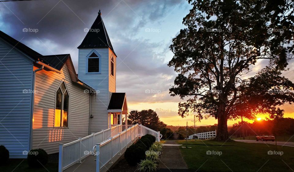 little white church at sundown