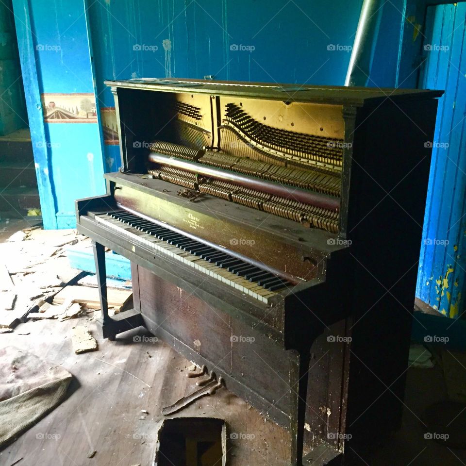 Broken Piano in Abandoned Home