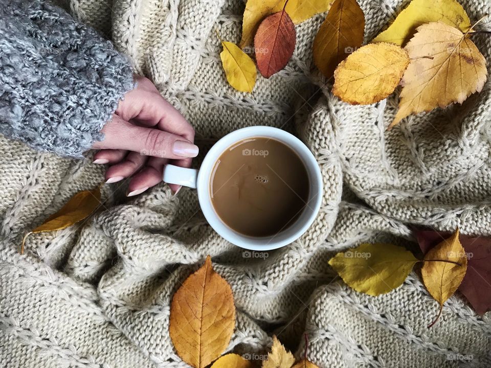 Autumn melancholy with coffee cup 