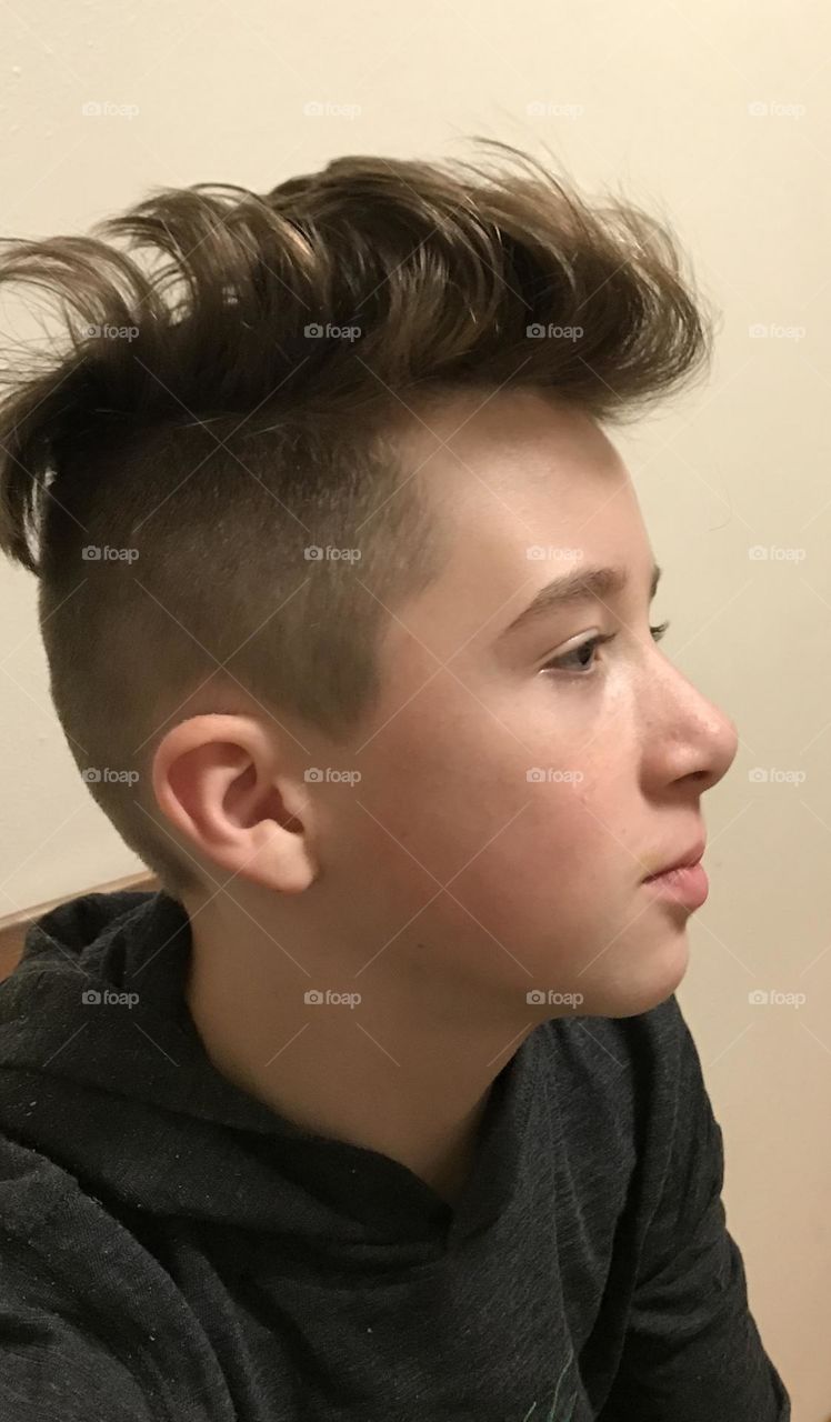 Young man with new hairstyle 