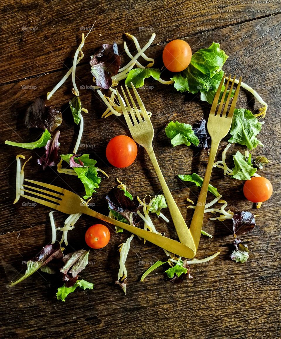 fork in the table with vegetables
