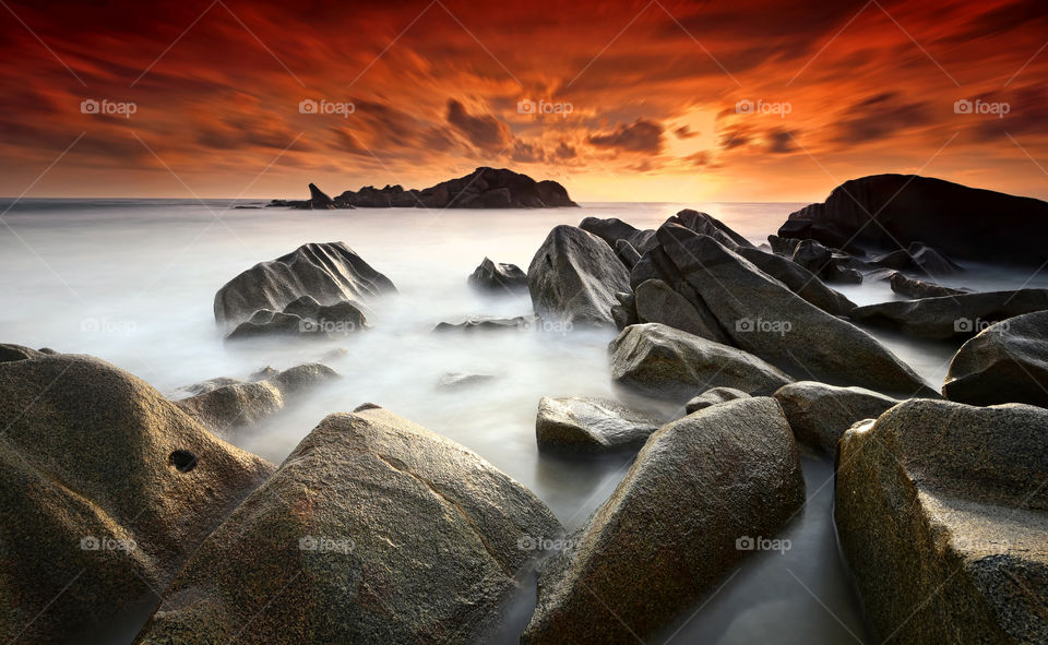 Wake Me Up. The long exposure sunrise at Penunjuk Beach Kemaman Terengganu with sleeping giant as background