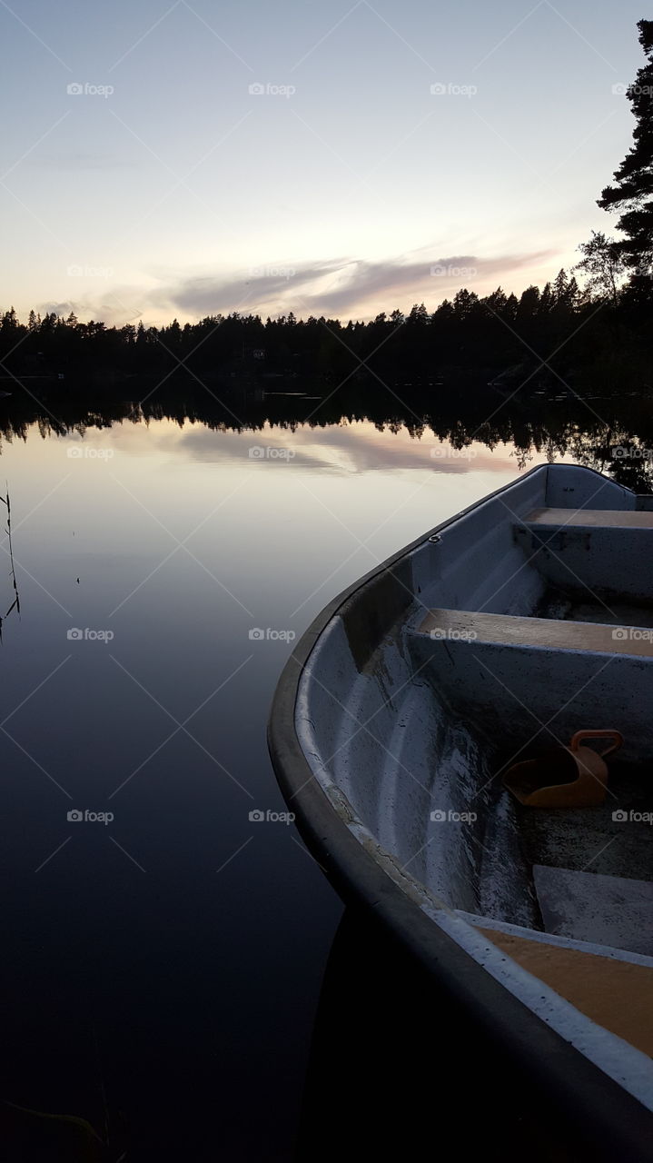 Close-up of boat on calm lake