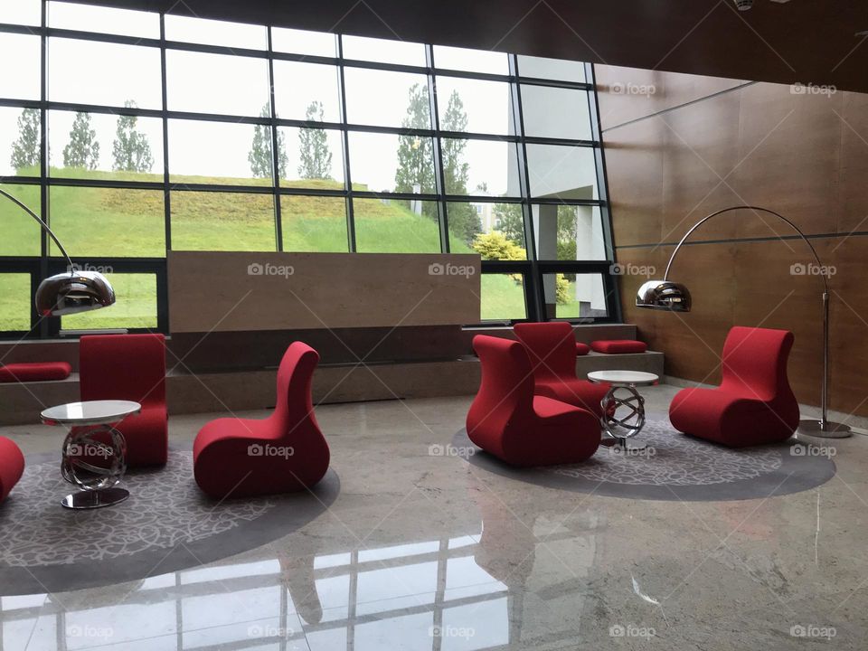 Red chairs at hall