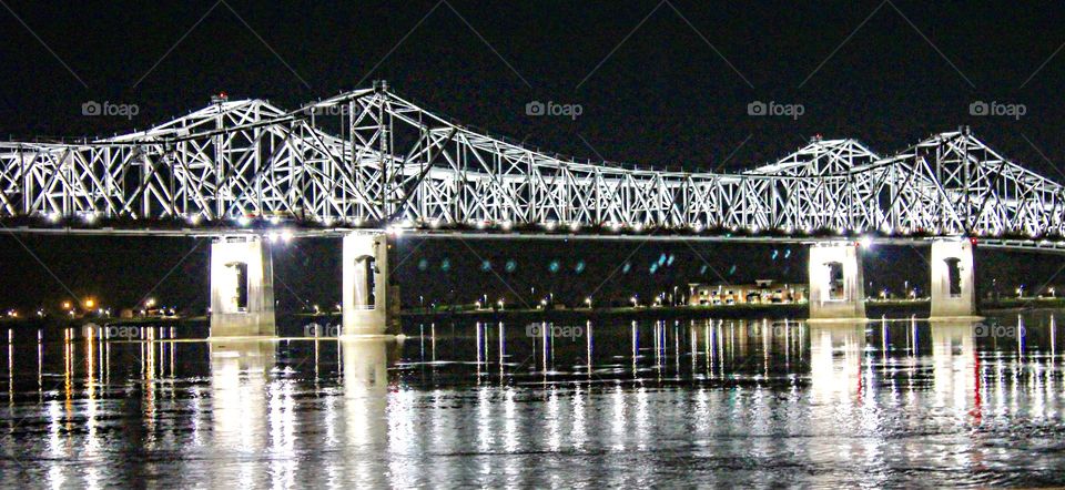 Pillars reflected in river.