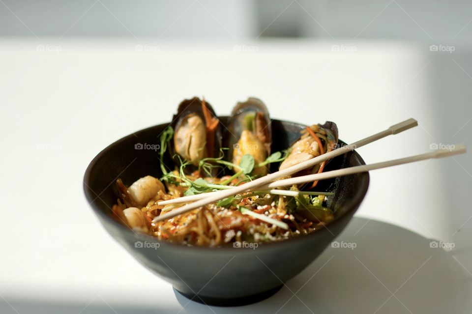 close-up of a plate with Asian cuisine