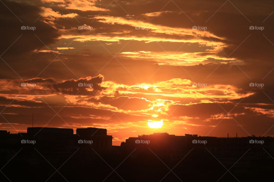 Sunset in Paris, France. . A cloudy sunset in paris, france.