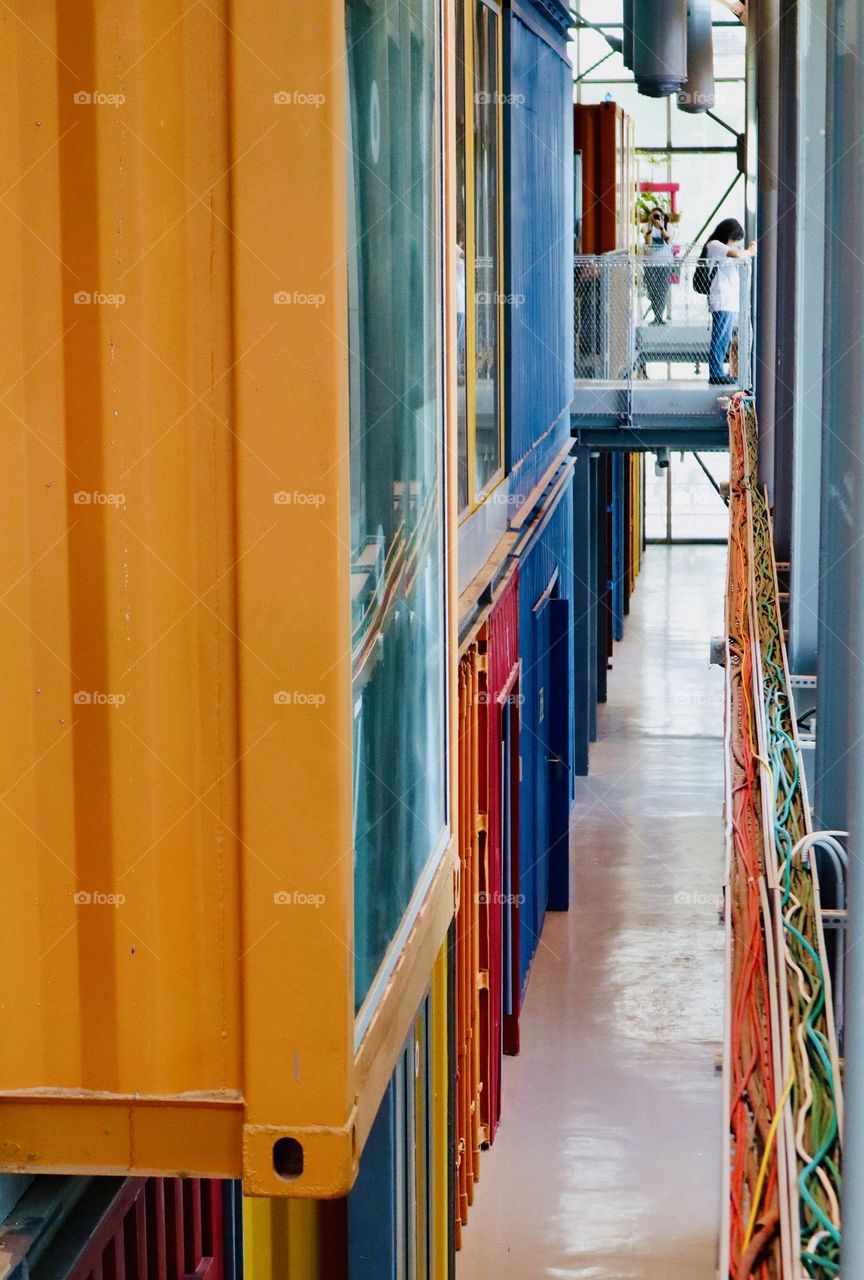 Colourful containers building and cables 