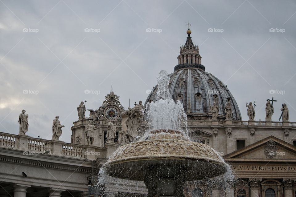 view of Vatican behind fountain