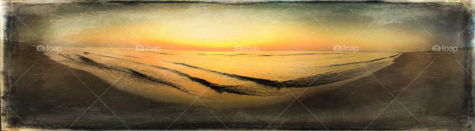 Textured panorama of the beach at sunset, Wassenaarse Slag, Netherlands.
