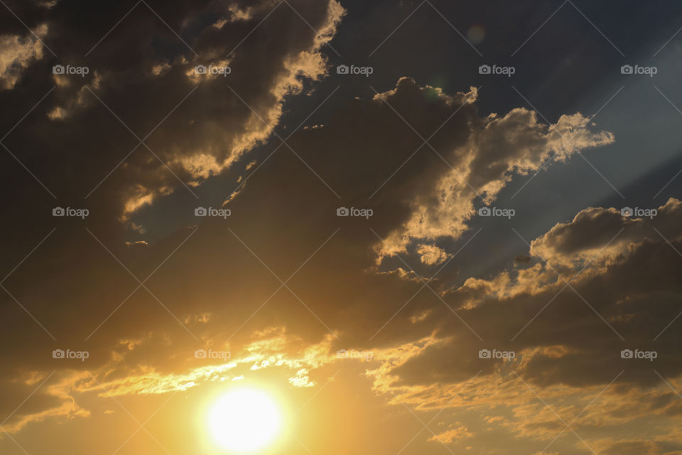 Sun peaking from the clouds